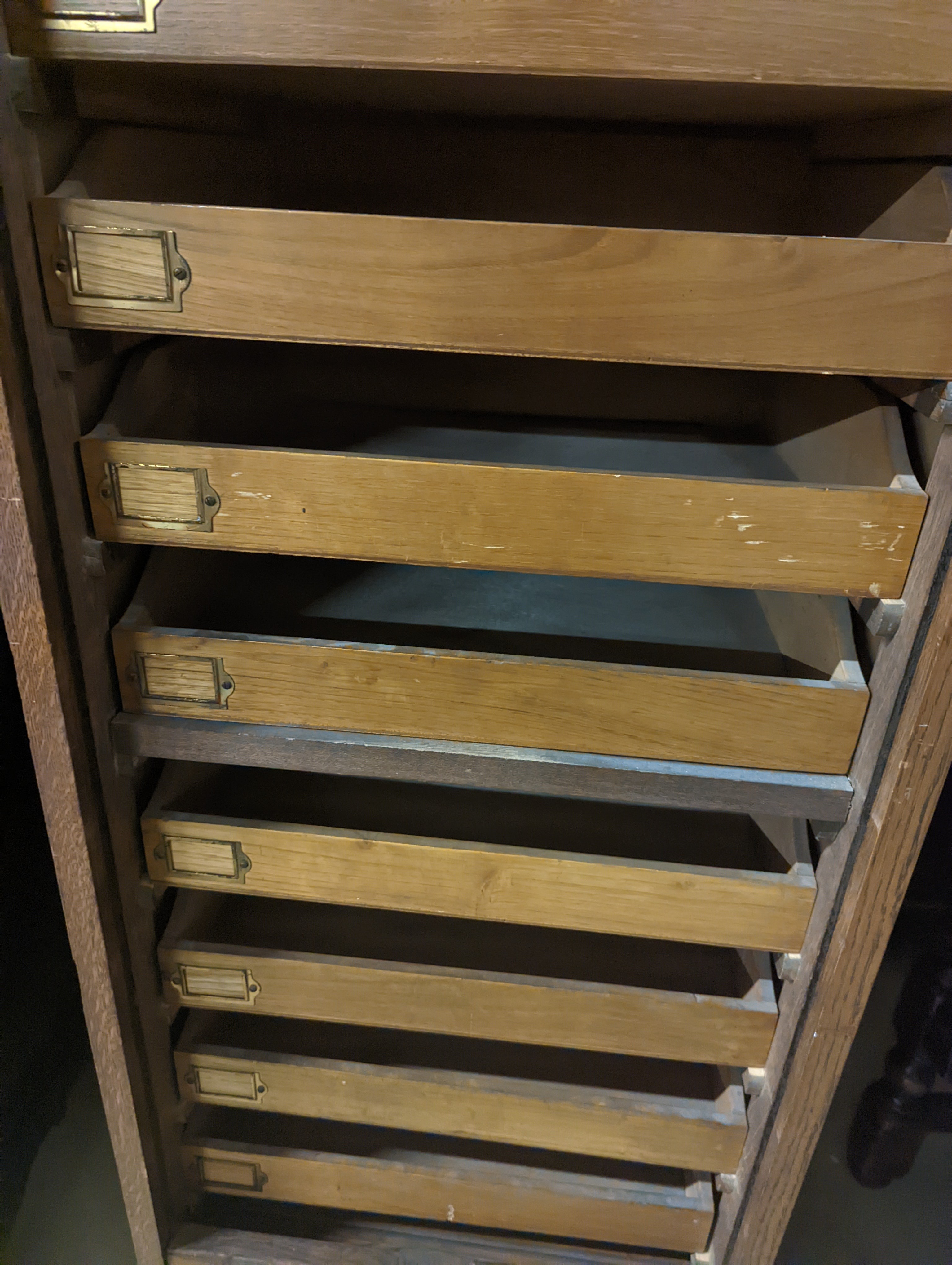 An early 20th century oak tambour filing cabinet, width 49cm, depth 40cm, height 125cm